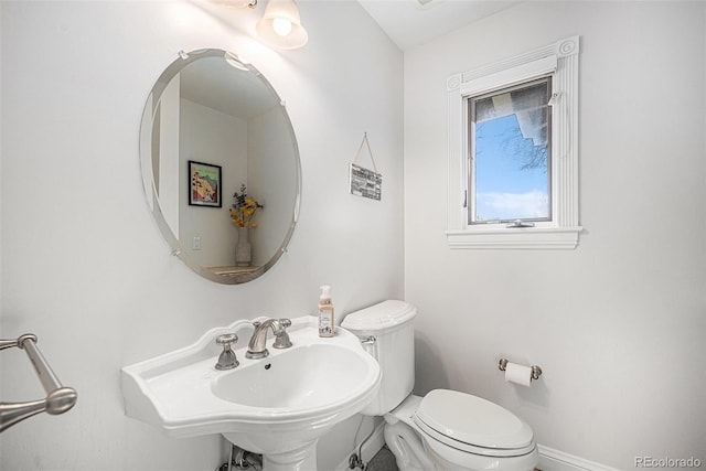 bathroom featuring sink and toilet