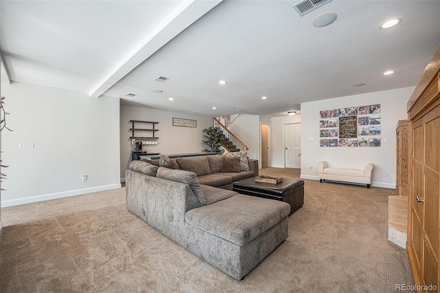 living room featuring light colored carpet