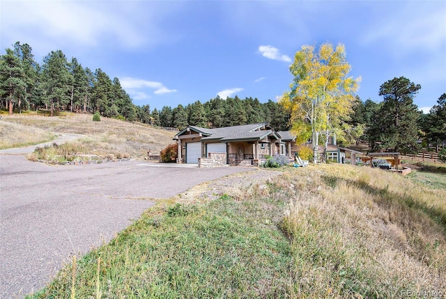 ranch-style home featuring a garage