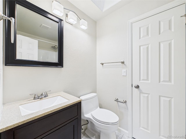 bathroom featuring visible vents, marble finish floor, toilet, and vanity