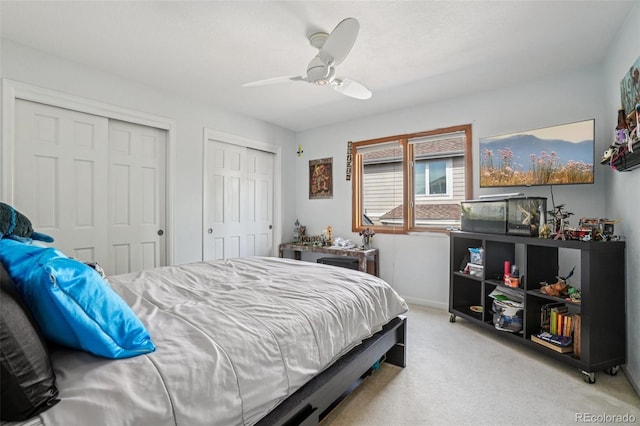 5564 S Jasper Way, Centennial, CO 80015 - bedroom with carpet, multiple closets, and ceiling fan