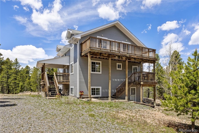 266 Gap Rd, Black Hawk, CO 80422 - rear view of property with stairs and a deck