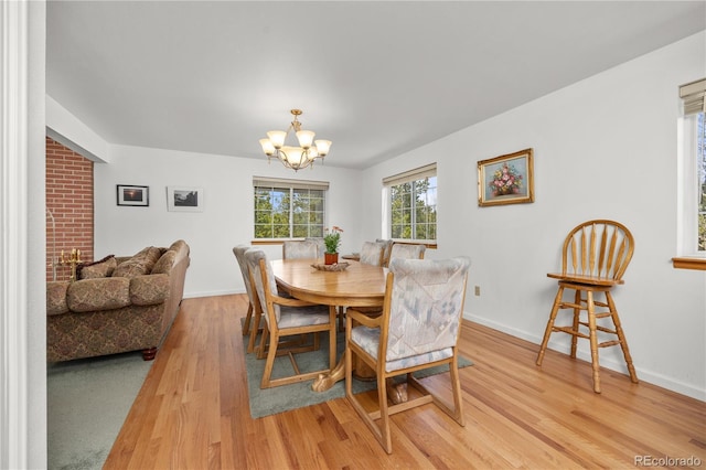 266 Gap Rd, Black Hawk, CO 80422 - dining space featuring light wood-type flooring and a chandelier