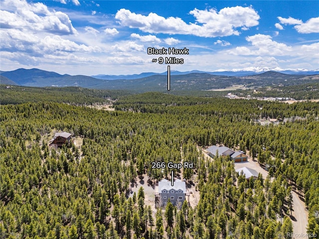 266 Gap Rd, Black Hawk, CO 80422 - bird's eye view of a heavily wooded area and a mountainous background