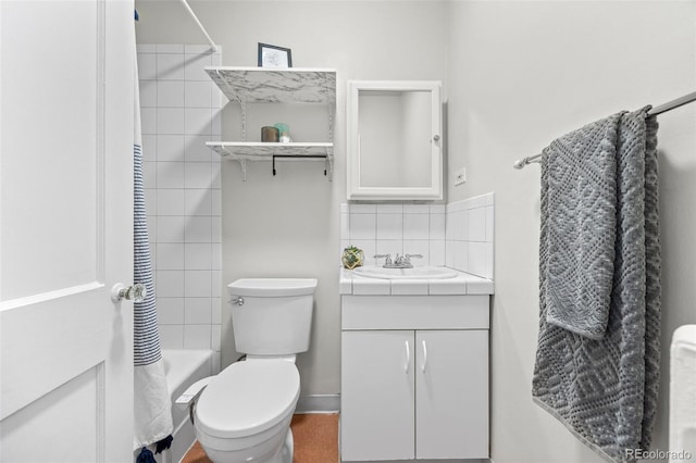 2616 Utica St, Denver, CO 80212 - full bath featuring vanity, bathtub / shower combination, toilet, and backsplash