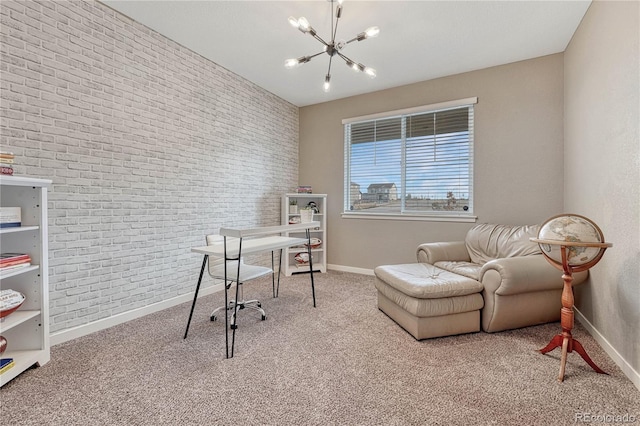 carpeted home office with a chandelier, brick wall, and baseboards