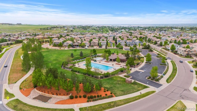 aerial view of residential area with a pool area