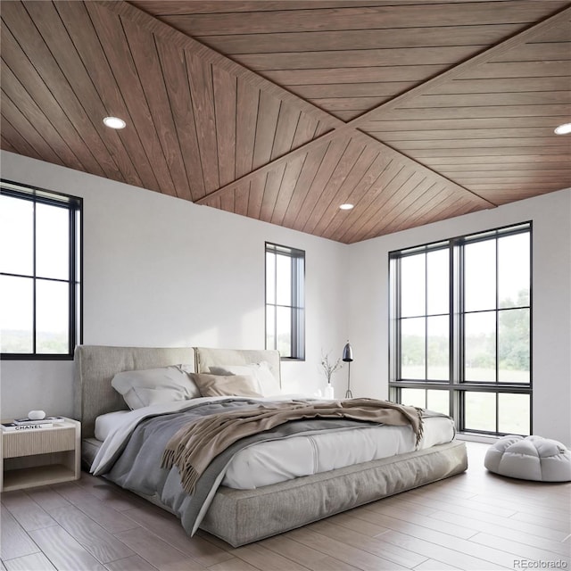 bedroom with wood ceiling and light hardwood / wood-style floors