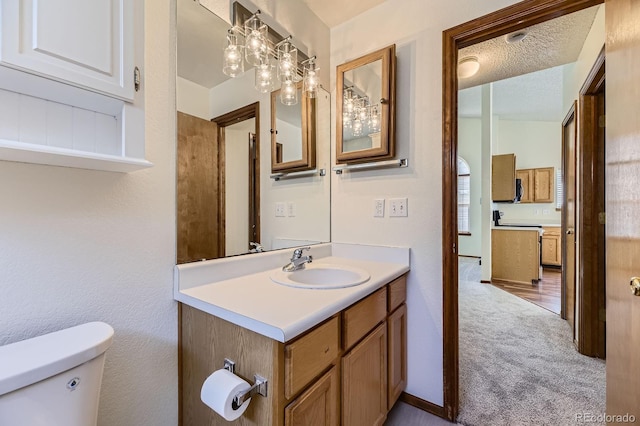 17692 E Brown Cir, Aurora, CO 80013 - bathroom featuring toilet and vanity