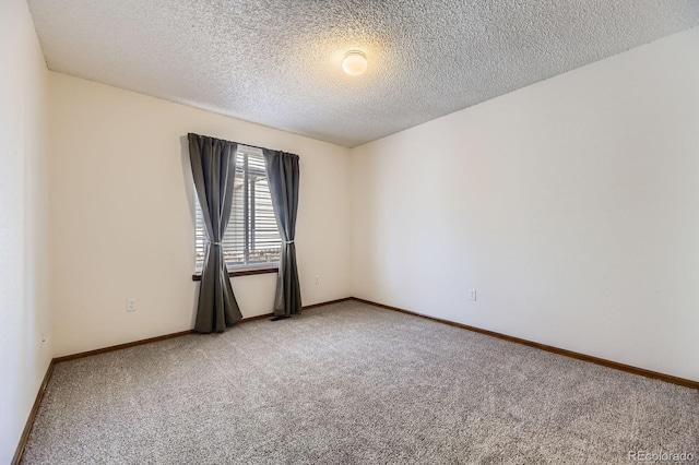 17692 E Brown Cir, Aurora, CO 80013 - empty room with light colored carpet and a textured ceiling