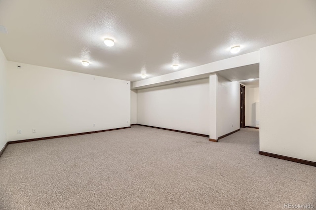 17692 E Brown Cir, Aurora, CO 80013 - finished below grade area with a textured ceiling and light colored carpet