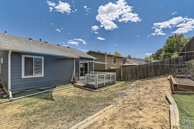 17692 E Brown Cir, Aurora, CO 80013 - view of yard with a deck and a vegetable garden