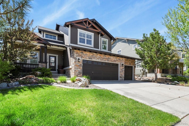 7243 S Kellerman Way, Aurora, CO 80016 - craftsman-style house with stone siding, concrete driveway, an attached garage, and a front lawn