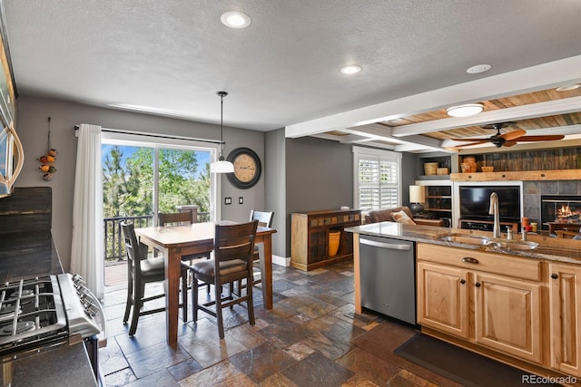 7243 S Kellerman Way, Aurora, CO 80016 - kitchen featuring appliances with stainless steel finishes, ceiling fan, stone counters, open floor plan, and recessed lighting