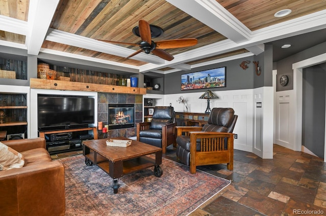 7243 S Kellerman Way, Aurora, CO 80016 - living area with ceiling fan, stone tile floors, beam ceiling, coffered ceiling, and wooden ceiling