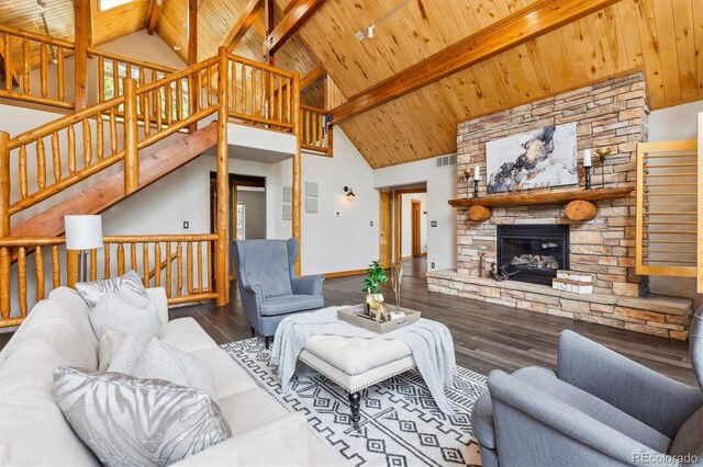 7317 Fremont Pl, Larkspur, CO 80118 - living area featuring wood ceiling, wood finished floors, beamed ceiling, and high vaulted ceiling