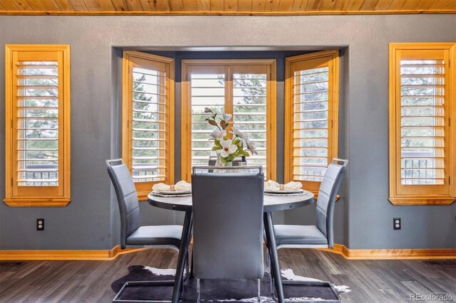7317 Fremont Pl, Larkspur, CO 80118 - dining space featuring baseboards and wood finished floors