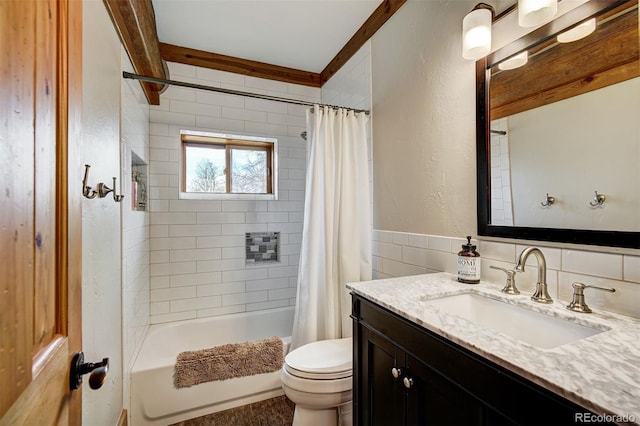 full bathroom featuring vanity, tile walls, toilet, and shower / bathtub combination with curtain