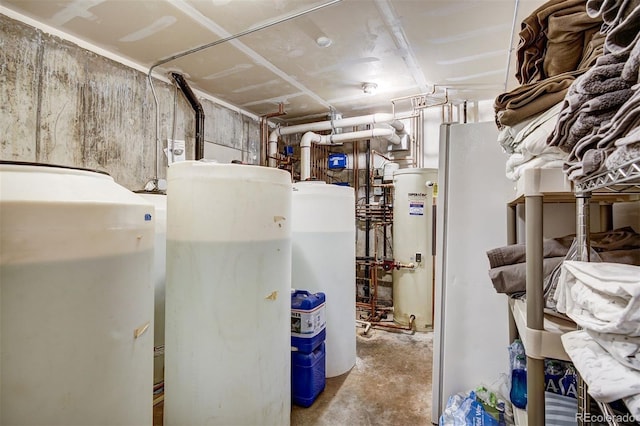 utility room featuring gas water heater