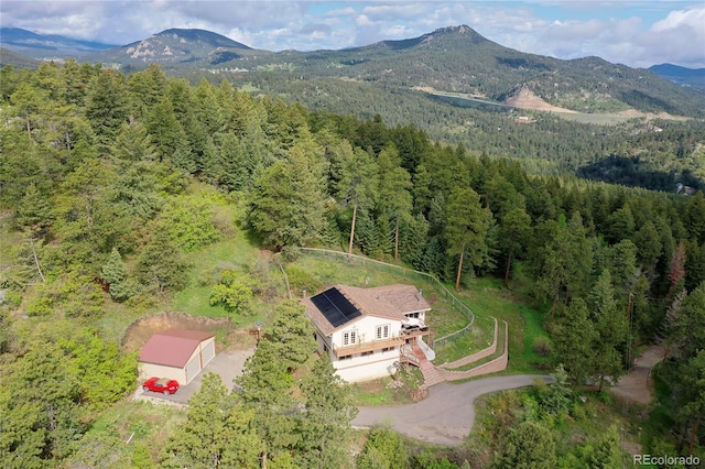 9648 Yegge Rd, Morrison, CO 80465 - view of subject property with a forest and mountains