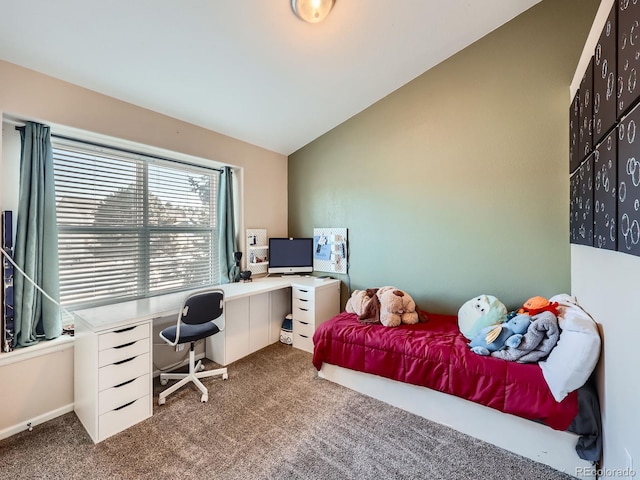 carpeted bedroom with vaulted ceiling