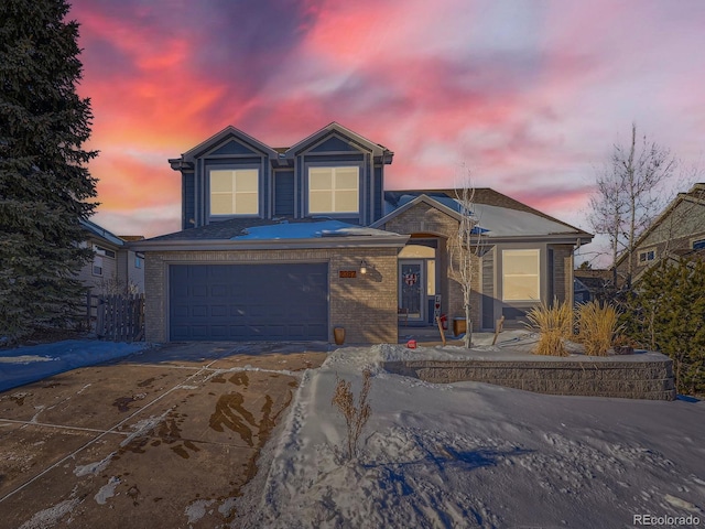 view of front of home featuring a garage