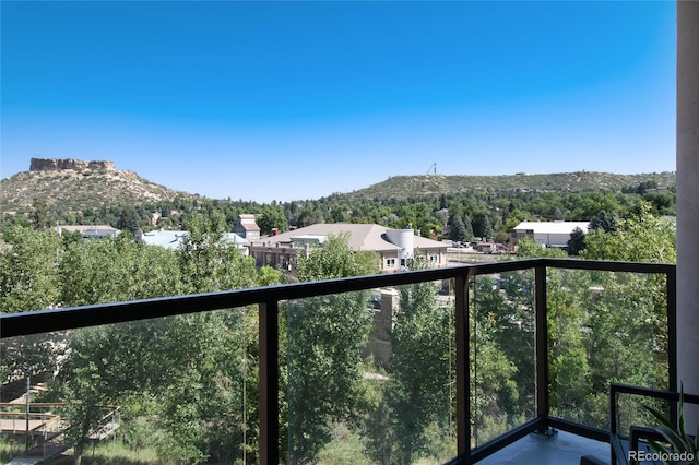 balcony featuring a mountain view