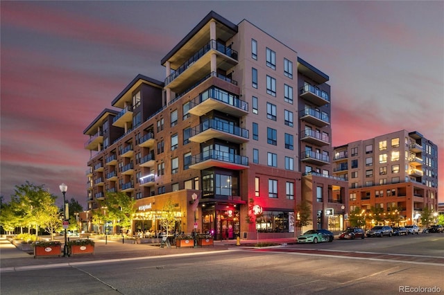 view of property at dusk