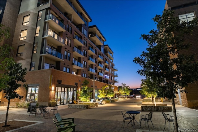 view of property at dusk