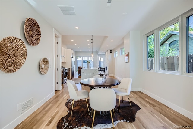 dining room featuring light wood-type flooring