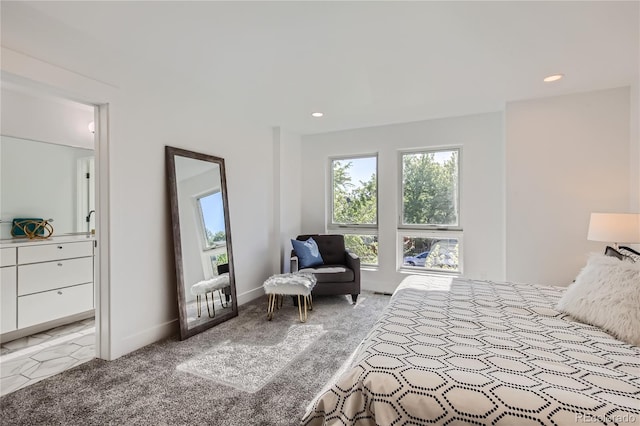 bedroom with light carpet