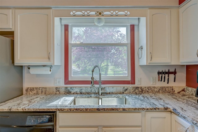 29250 County Road 330, Buena Vista, CO 81211 - kitchen featuring dishwashing machine, plenty of natural light, light stone counters, and white cabinets