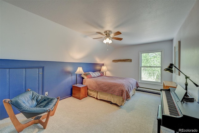 29250 County Road 330, Buena Vista, CO 81211 - bedroom featuring a baseboard heating unit, carpet flooring, a textured ceiling, ceiling fan, and vaulted ceiling