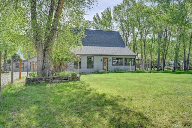 29250 County Road 330, Buena Vista, CO 81211 - view of front facade with a shingled roof and a front yard