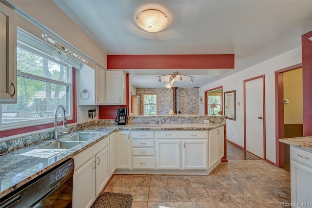 29250 County Road 330, Buena Vista, CO 81211 - kitchen with dishwasher, white cabinets, a peninsula, and light stone counters