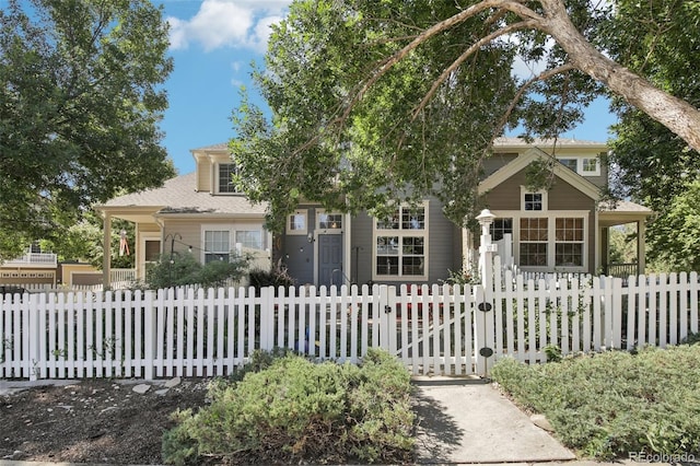 588 Beauprez Ave, Lafayette, CO 80026 - view of property hidden behind natural elements featuring a fenced front yard