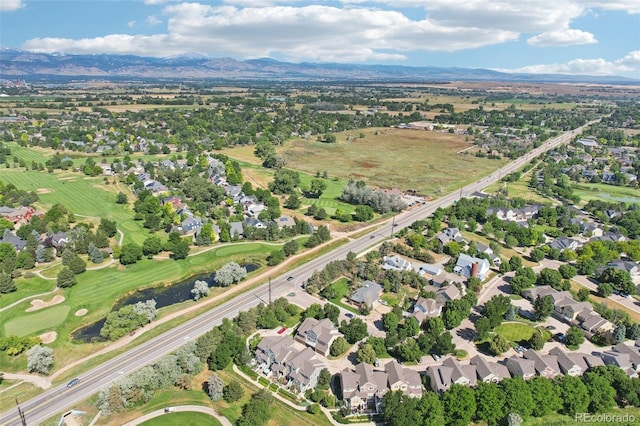 588 Beauprez Ave, Lafayette, CO 80026 - aerial overview of property's location with mountains and nearby suburban area