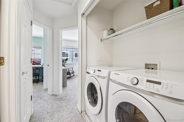 588 Beauprez Ave, Lafayette, CO 80026 - laundry area with light colored carpet and washing machine and clothes dryer