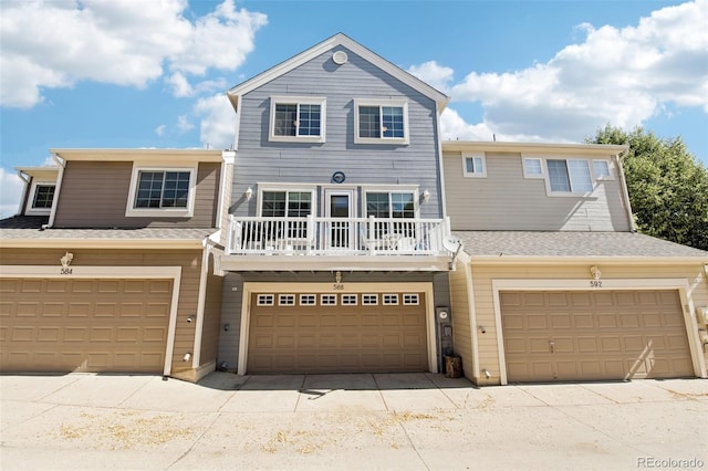 588 Beauprez Ave, Lafayette, CO 80026 - view of front of home with an attached garage and a balcony