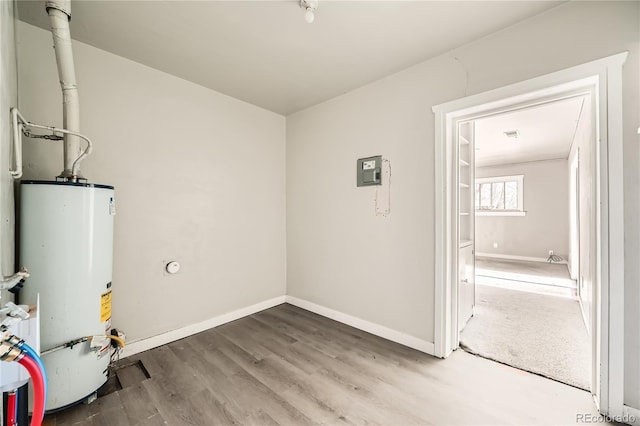 utility room with water heater