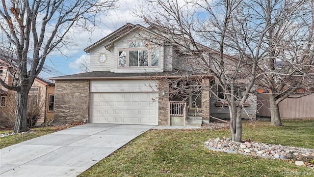 view of front facade featuring a front yard and a garage