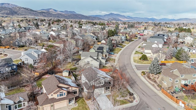 birds eye view of property featuring a mountain view