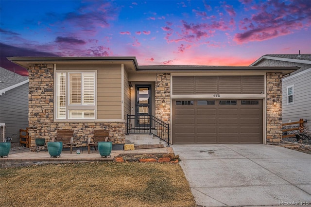 view of front of house with a garage