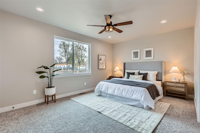 carpeted bedroom featuring baseboards, ceiling fan, recessed lighting, and visible vents