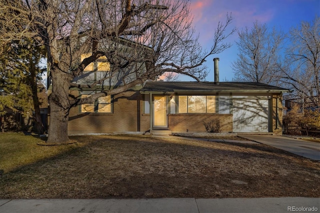 ranch-style home featuring a yard