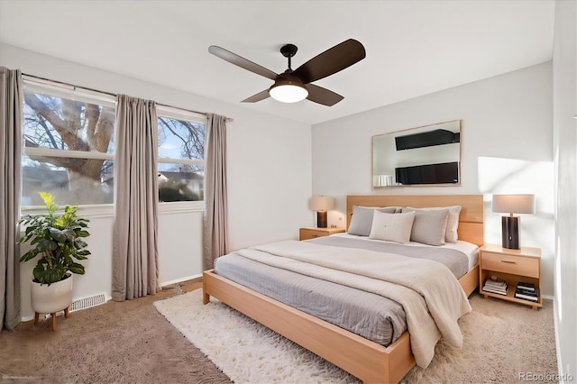 bedroom featuring ceiling fan and carpet flooring