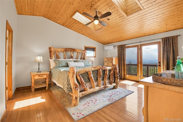 27100 Molly Dr, Conifer, CO 80433 - bedroom with access to exterior, vaulted ceiling, an AC wall unit, wood ceiling, and wood-type flooring
