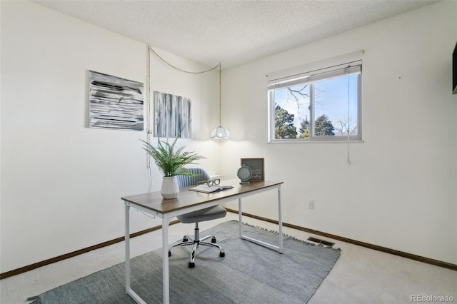 6750 Lange, Colorado Springs, CO 80918 - carpeted office space featuring a textured ceiling