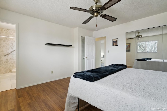 6750 Lange, Colorado Springs, CO 80918 - bedroom featuring ceiling fan, a textured ceiling, dark hardwood / wood-style flooring, and ensuite bath