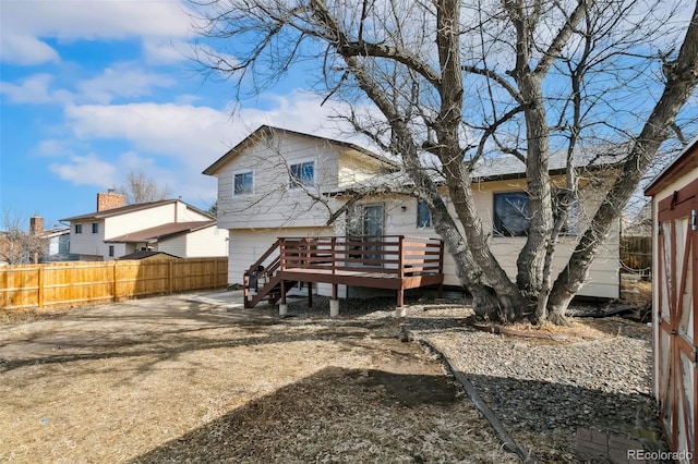 6750 Lange, Colorado Springs, CO 80918 - rear view of house with a deck